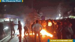 চাপাইনবাবগঞ্জে ট্রাকের ধাক্কায় নিহত ২, ট্রাফিক বক্সে আগুন