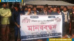 বাগাতিপাড়ায় রাস্তা নির্মাণে অনিয়মের অভিযোগে মানববন্ধন